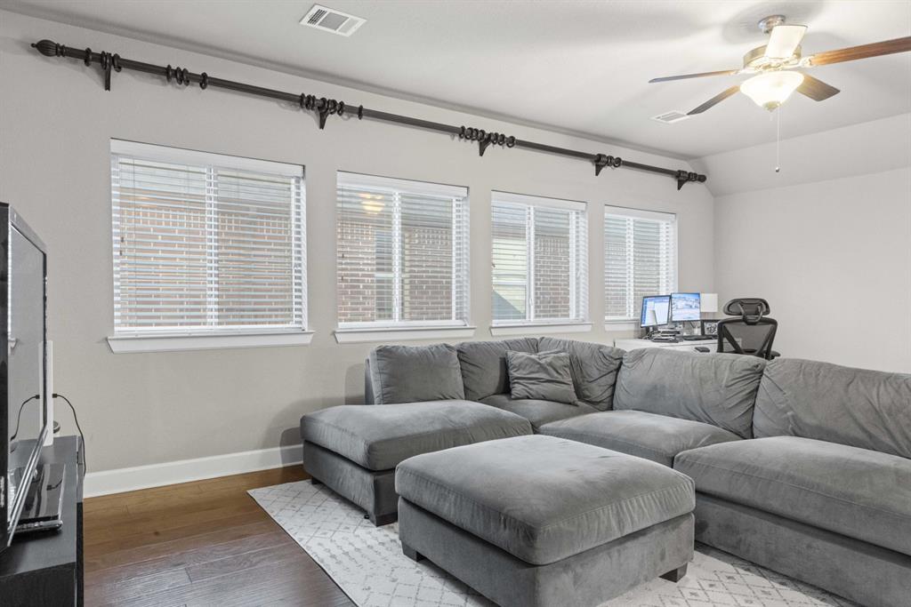 5417 Harbour Road Richardson, TX 75082 - Photo 12 of 23 a living room with furniture and a window