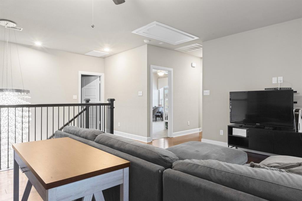 5417 Harbour Road Richardson, TX 75082 - Photo 14 of 23 a living room with furniture and a flat screen tv