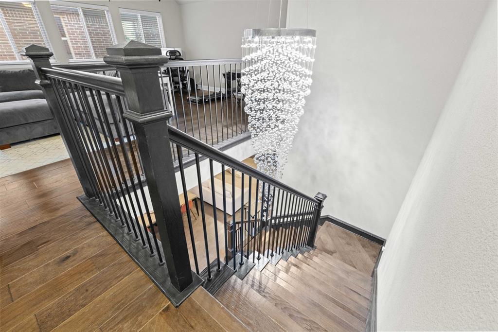 5417 Harbour Road Richardson, TX 75082 - Photo 16 of 23 a view of entryway and hall with wooden floor