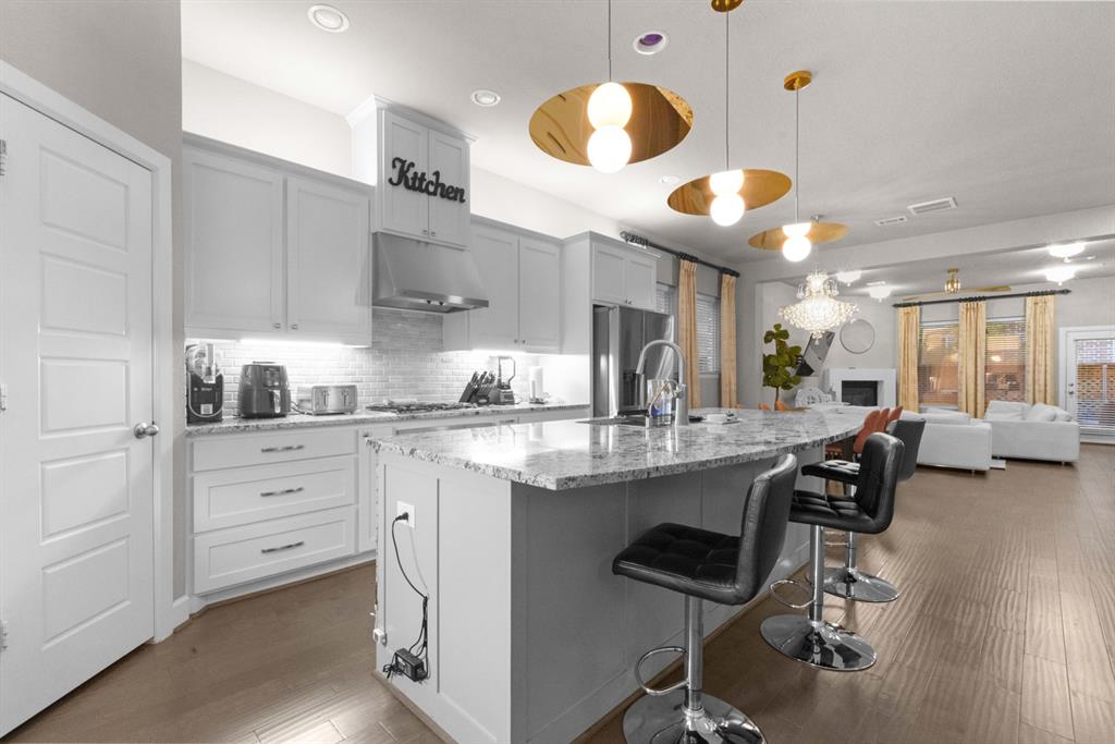 5417 Harbour Road Richardson, TX 75082 - Photo 5 of 23 a kitchen with a sink cabinets and window