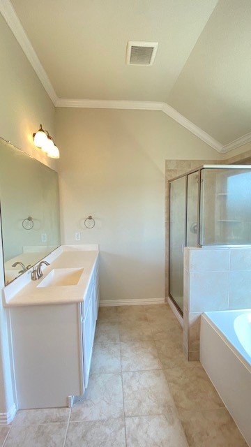5002 Naples Grove Lane Rosharon, TX 77583 - Photo 28 of 38 Bright and spacious bathroom featuring a sleek vanity, large mirror, and a glass-enclosed shower alongside a relaxing bathtub.