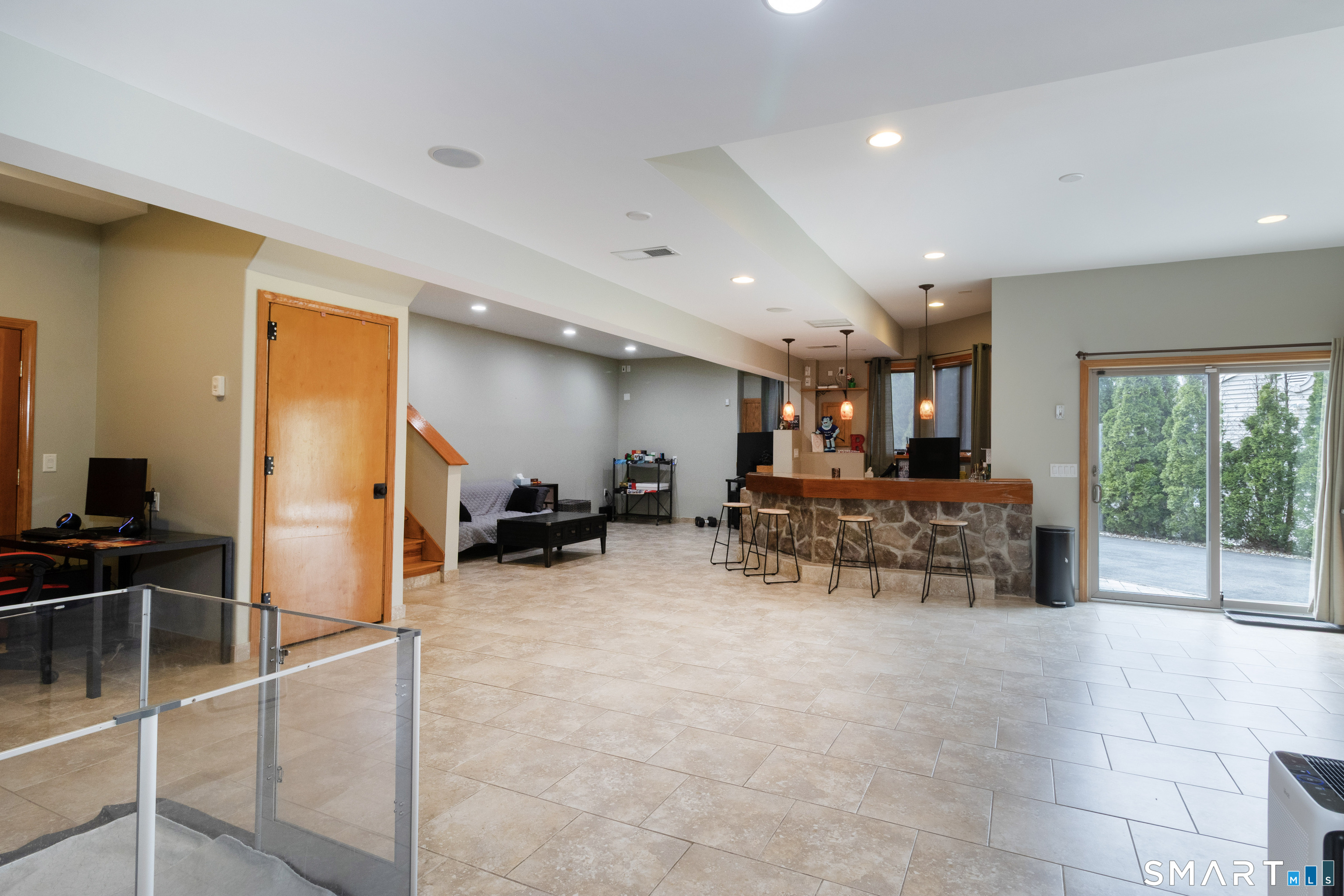 113 Pinnacle Road Plainville, CT 06062 - Photo 18 of 36 The entire lower level is tiled with access from the driveway and lower garage