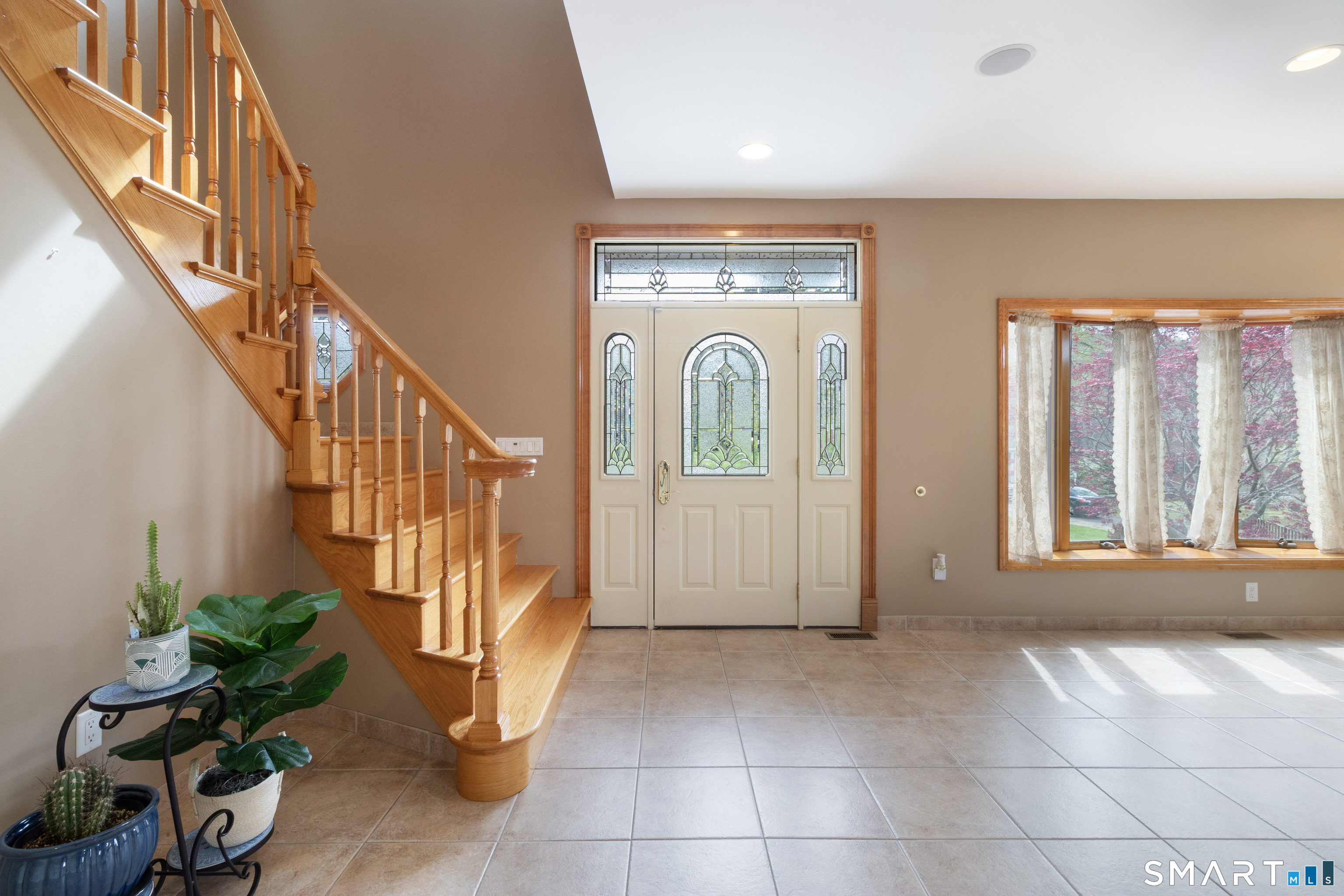 113 Pinnacle Road Plainville, CT 06062 - Photo 2 of 36 You're greeted by an expansive and sunlit foyer