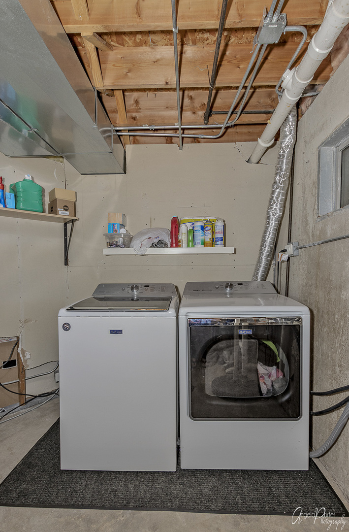 26276 West Rollins Road Ingleside, IL 60041 - Photo 22 of 28 a utility room with dryer and washer