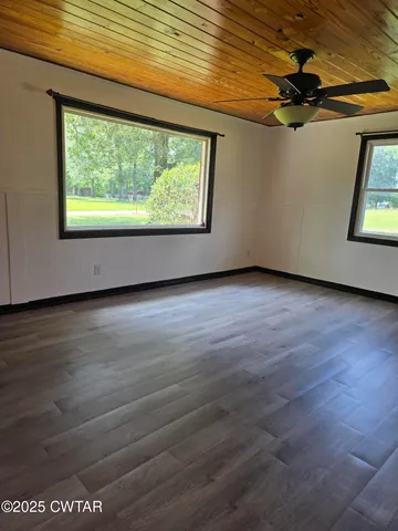 an empty room with windows