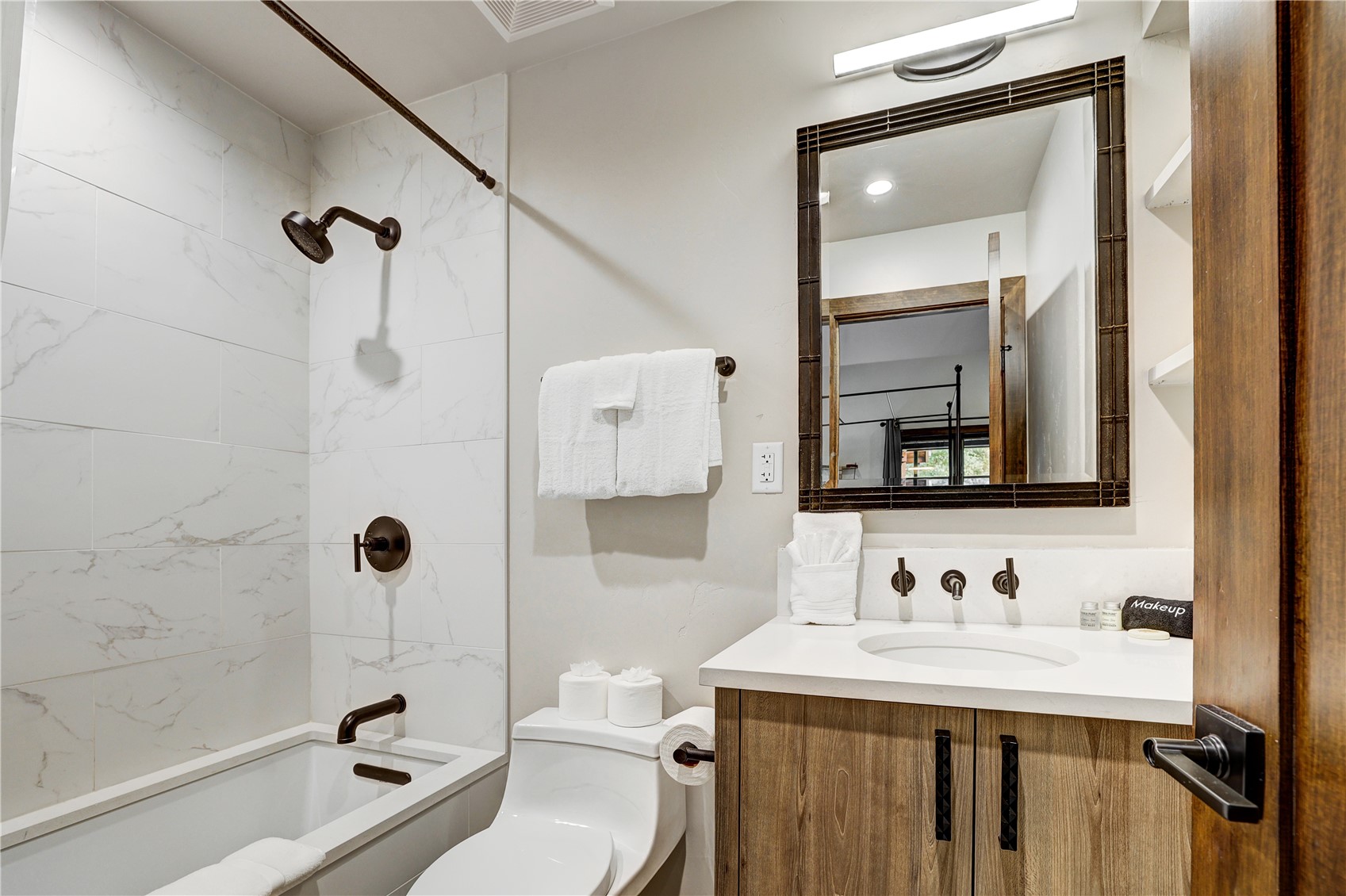 620 4 O Clock Road, Unit 336 Breckenridge, CO 80424 - Photo 11 of 29 Full bathroom featuring tiled shower / bath, vanity, and toilet