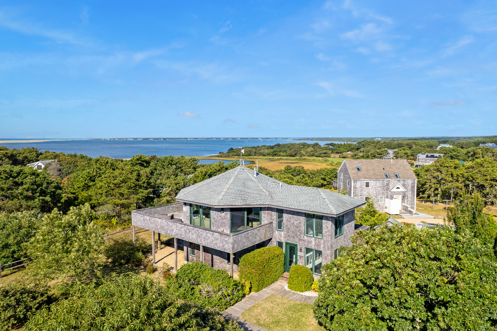 76 Washque Avenue Edgartown, MA 02539 - Photo 1 of 50 an aerial view of a house with a garden