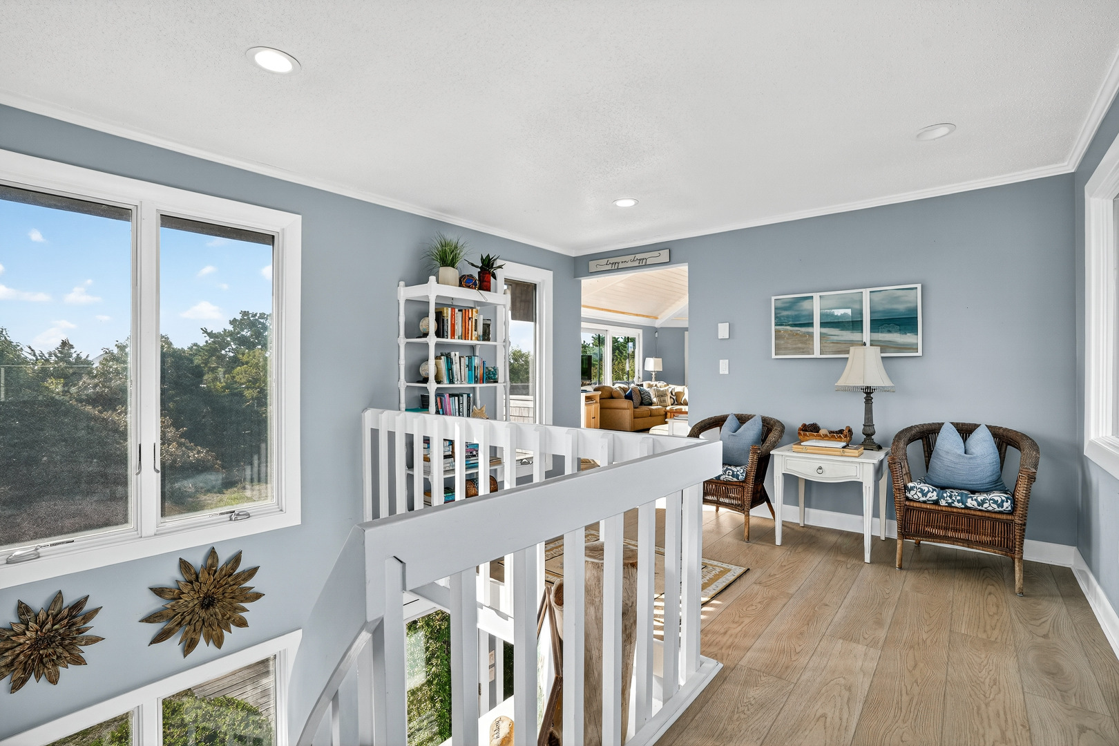 76 Washque Avenue Edgartown, MA 02539 - Photo 11 of 50 a bedroom with furniture and a book shelf