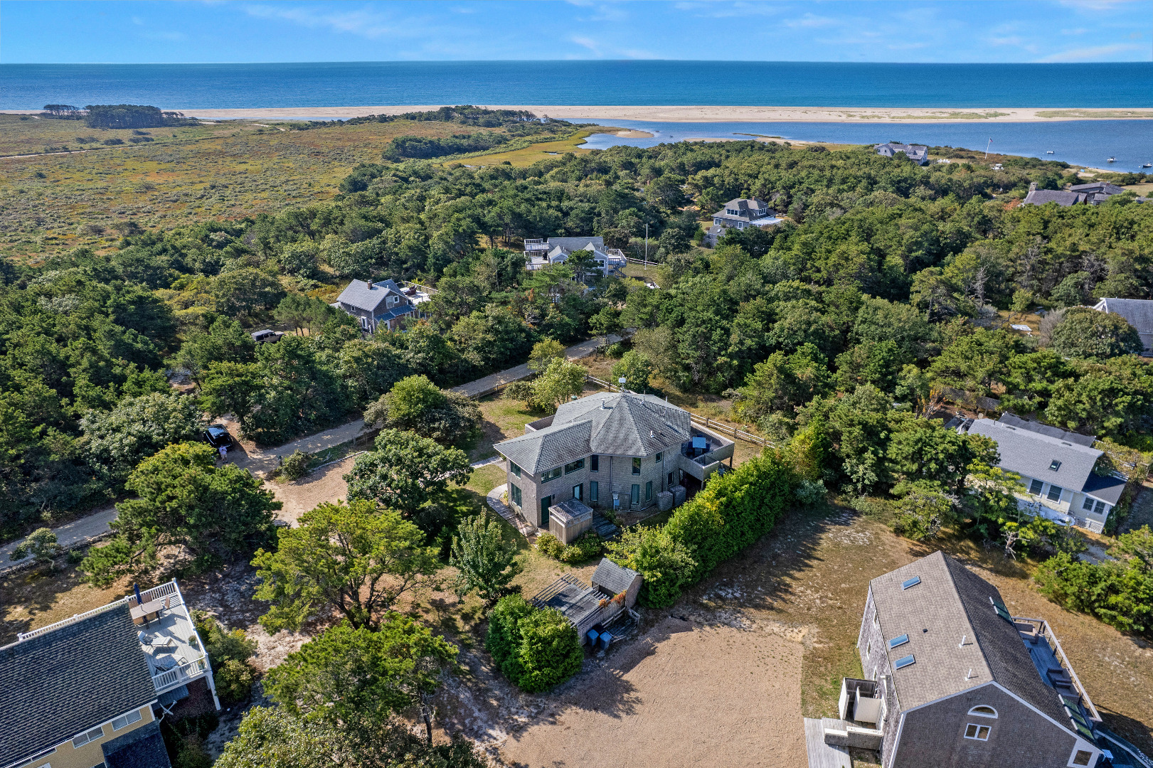 76 Washque Avenue Edgartown, MA 02539 - Photo 3 of 50 an aerial view of a city and mountain view in back