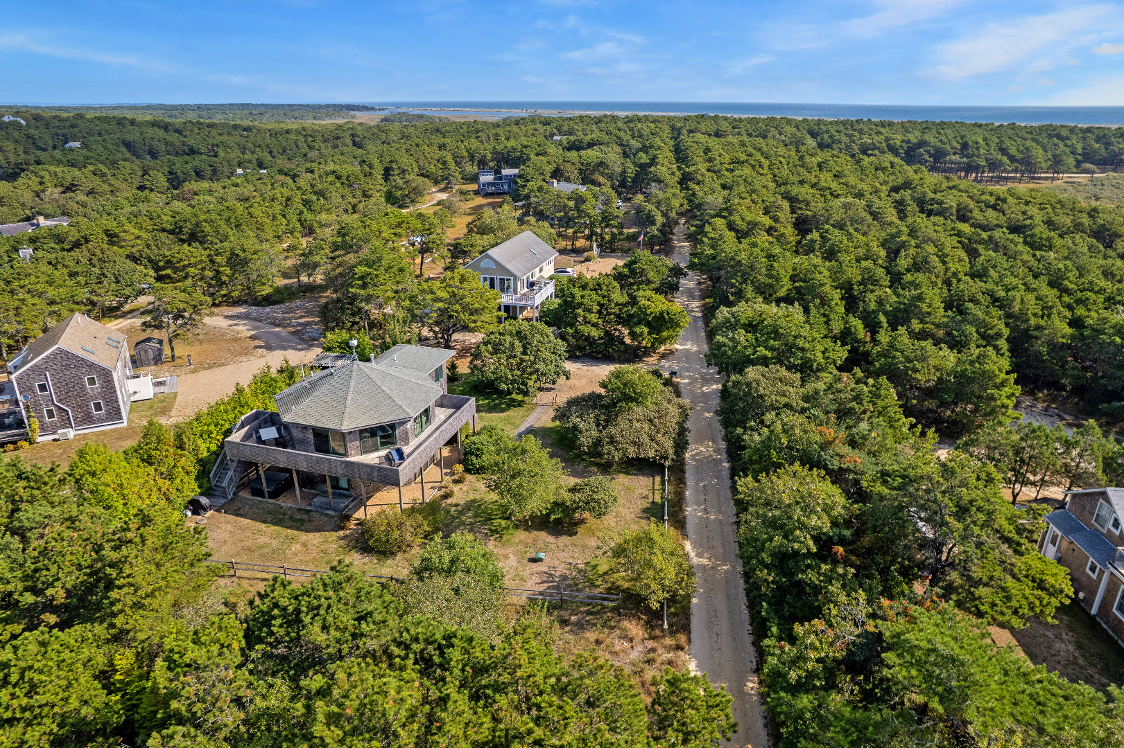 76 Washque Avenue Edgartown, MA 02539 - Photo 48 of 50 an aerial view of houses with yard