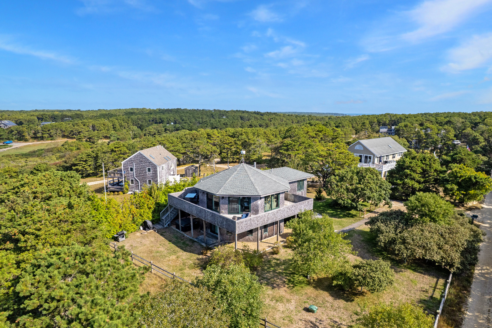 76 Washque Avenue Edgartown, MA 02539 - Photo 49 of 50 a view of a house with a ocean view