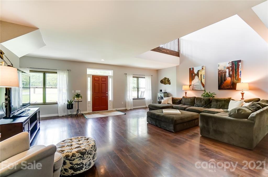 339 Lancaster Estate Road Indian Land, SC 29707 - Photo 11 of 48 a living room with furniture and wooden floor