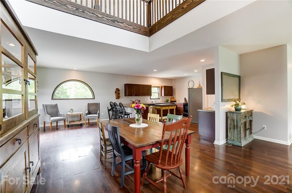 339 Lancaster Estate Road Indian Land, SC 29707 - Photo 12 of 48 a view of a dining room with furniture window and wooden floor