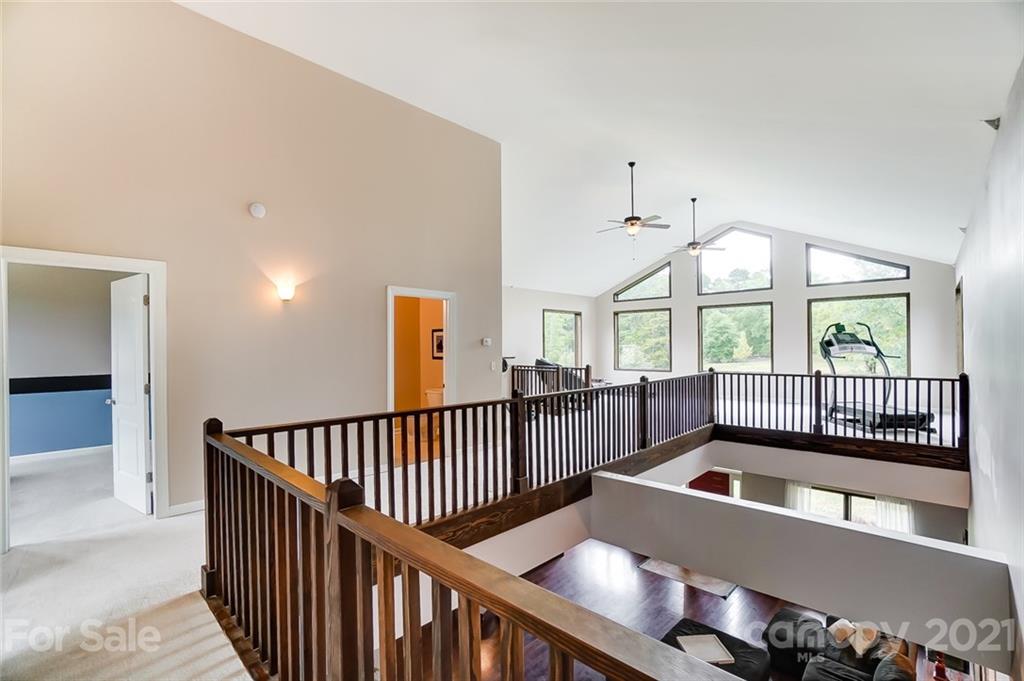 339 Lancaster Estate Road Indian Land, SC 29707 - Photo 25 of 48 a view of a hallway with windows