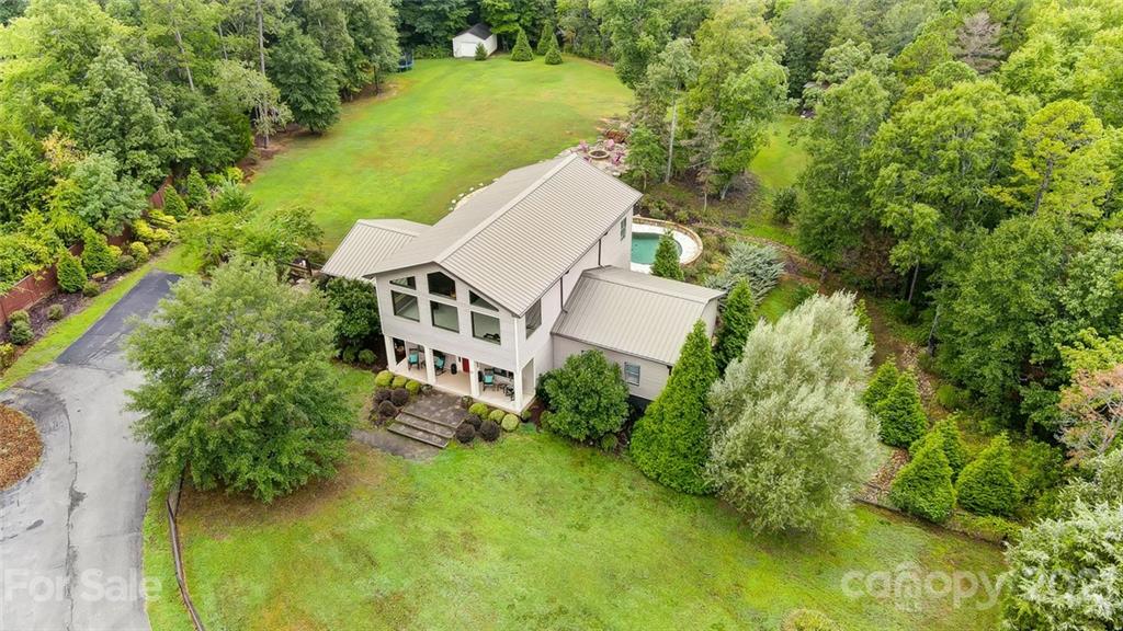339 Lancaster Estate Road Indian Land, SC 29707 - Photo 4 of 48 an aerial view of a house with pool yard and outdoor seating