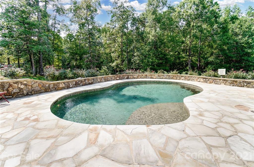339 Lancaster Estate Road Indian Land, SC 29707 - Photo 41 of 48 a view of a swimming pool with a yard