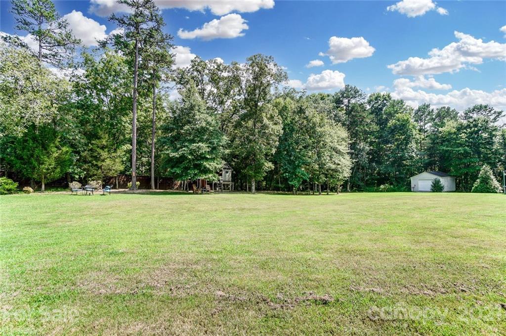 339 Lancaster Estate Road Indian Land, SC 29707 - Photo 45 of 48 a view of a field with an trees