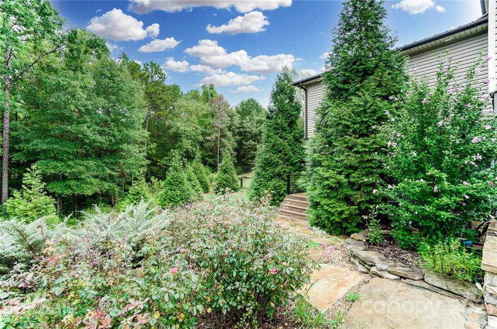 339 Lancaster Estate Road Indian Land, SC 29707 - Photo 47 of 48 a view of a garden with plants and a yard
