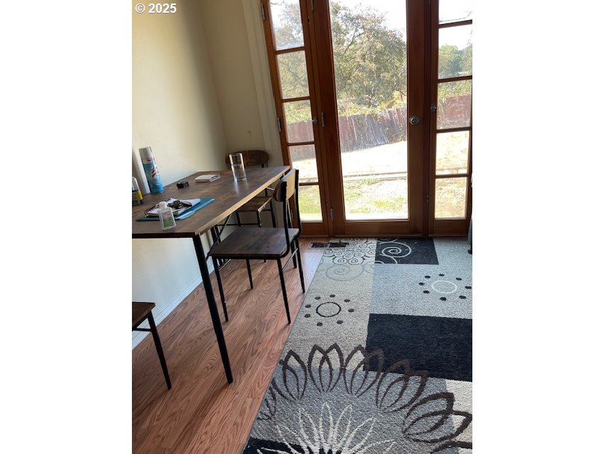 353 Donald Terrace Myrtle Creek, OR 97457 - Photo 16 of 18 a balcony with table and chairs