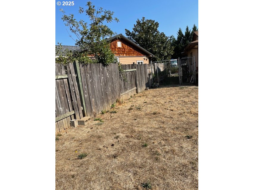 353 Donald Terrace Myrtle Creek, OR 97457 - Photo 5 of 18 a view of a backyard of the house