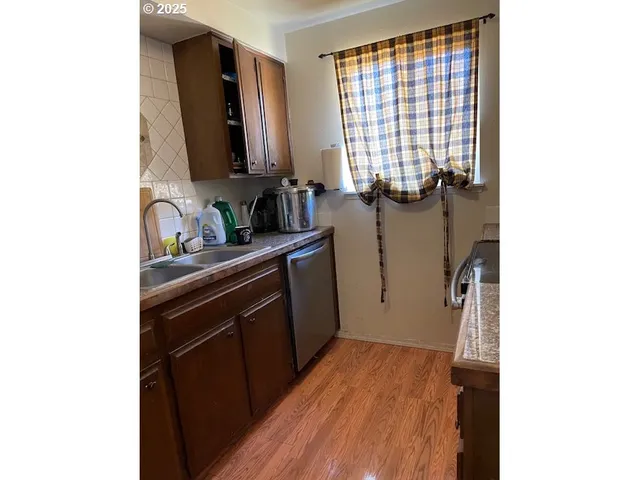 a room with a sink and a mirror