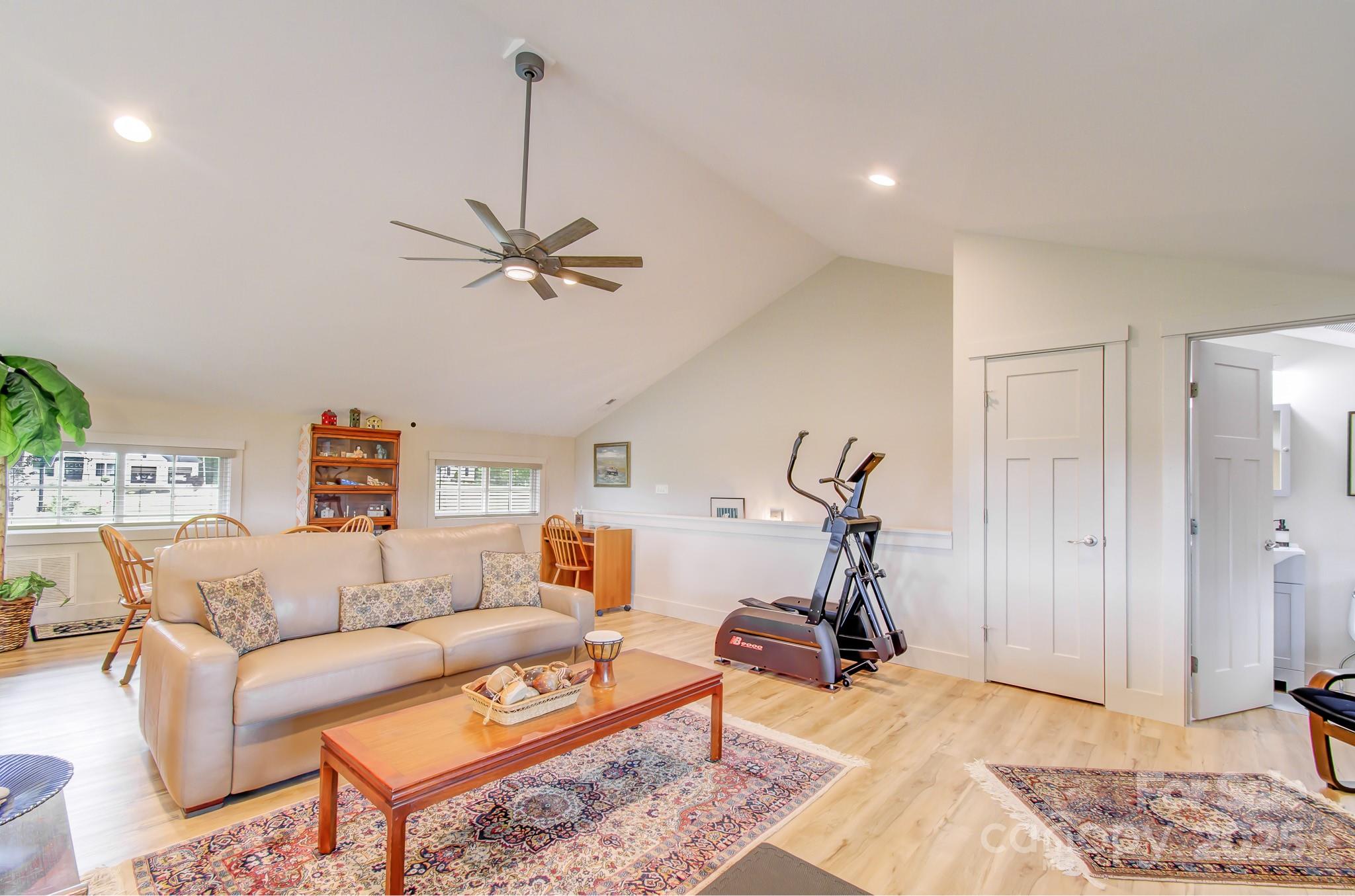 147 Majestic Ridge Road Mills River, NC 28759 - Photo 16 of 48 a living room with furniture and a rug