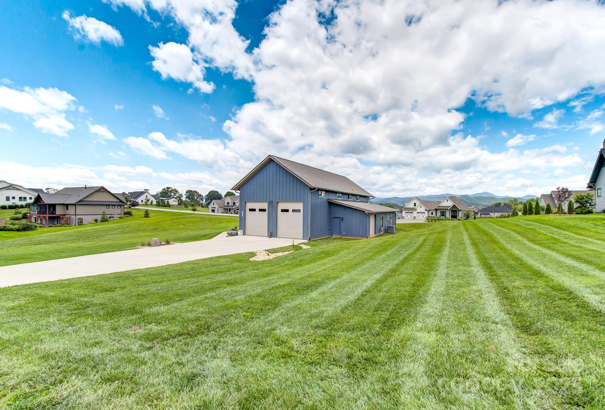 147 Majestic Ridge Road Mills River, NC 28759 - Photo 31 of 48 a view of a house with a big yard