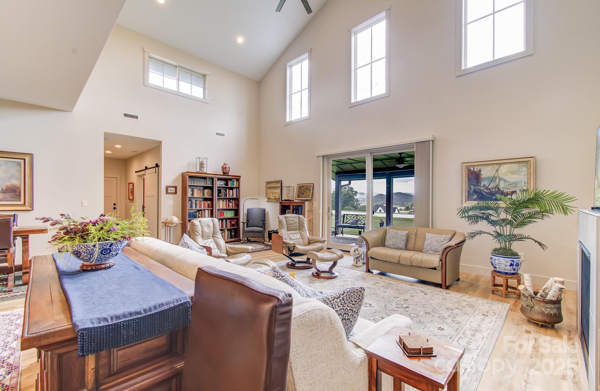 147 Majestic Ridge Road Mills River, NC 28759 - Photo 9 of 48 a living room with furniture and wooden floor