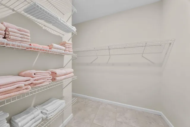 a view of a balcony with lake view and wooden floor