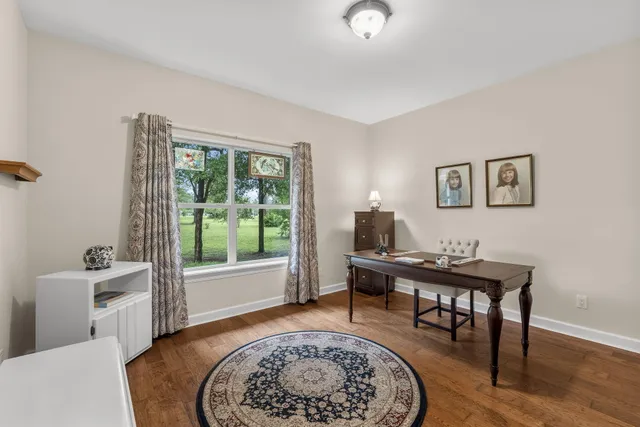 a view of staircase with white walls and windows