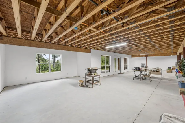 a view of a lake with a yard