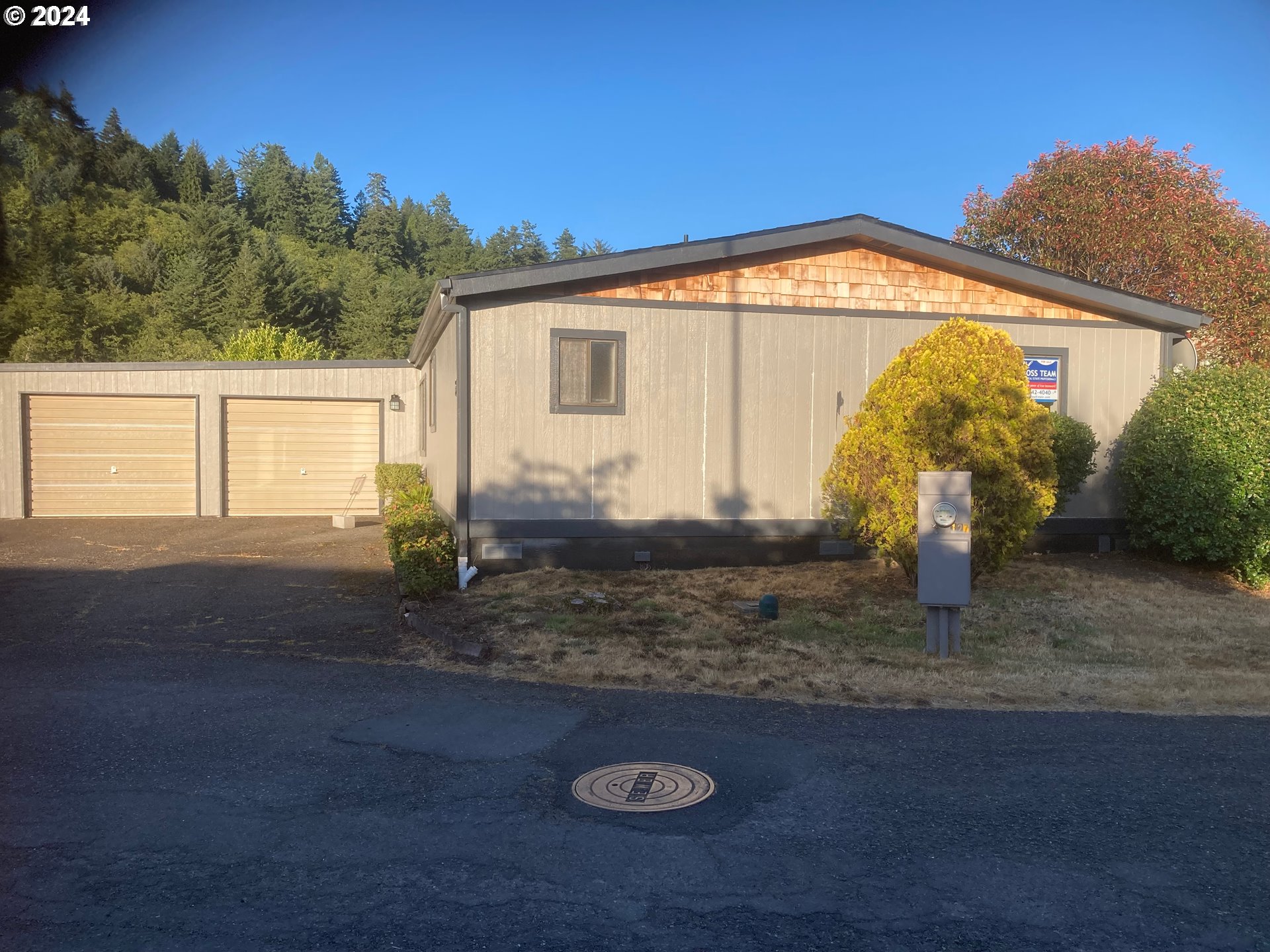 100 River Bend Road, Unit 127 Reedsport, OR 97467 - Photo 13 of 21 a view of a house with backyard and garden