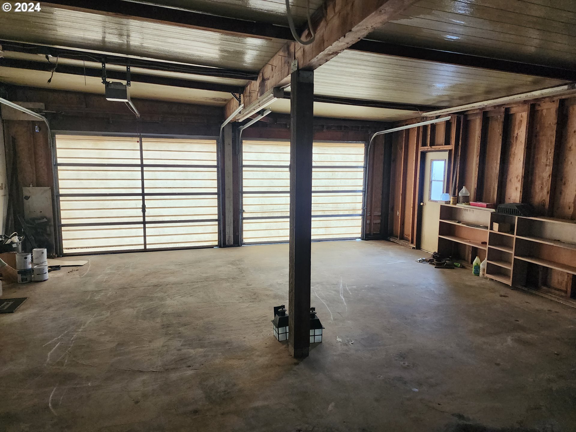 100 River Bend Road, Unit 127 Reedsport, OR 97467 - Photo 20 of 21 a view of room with garage