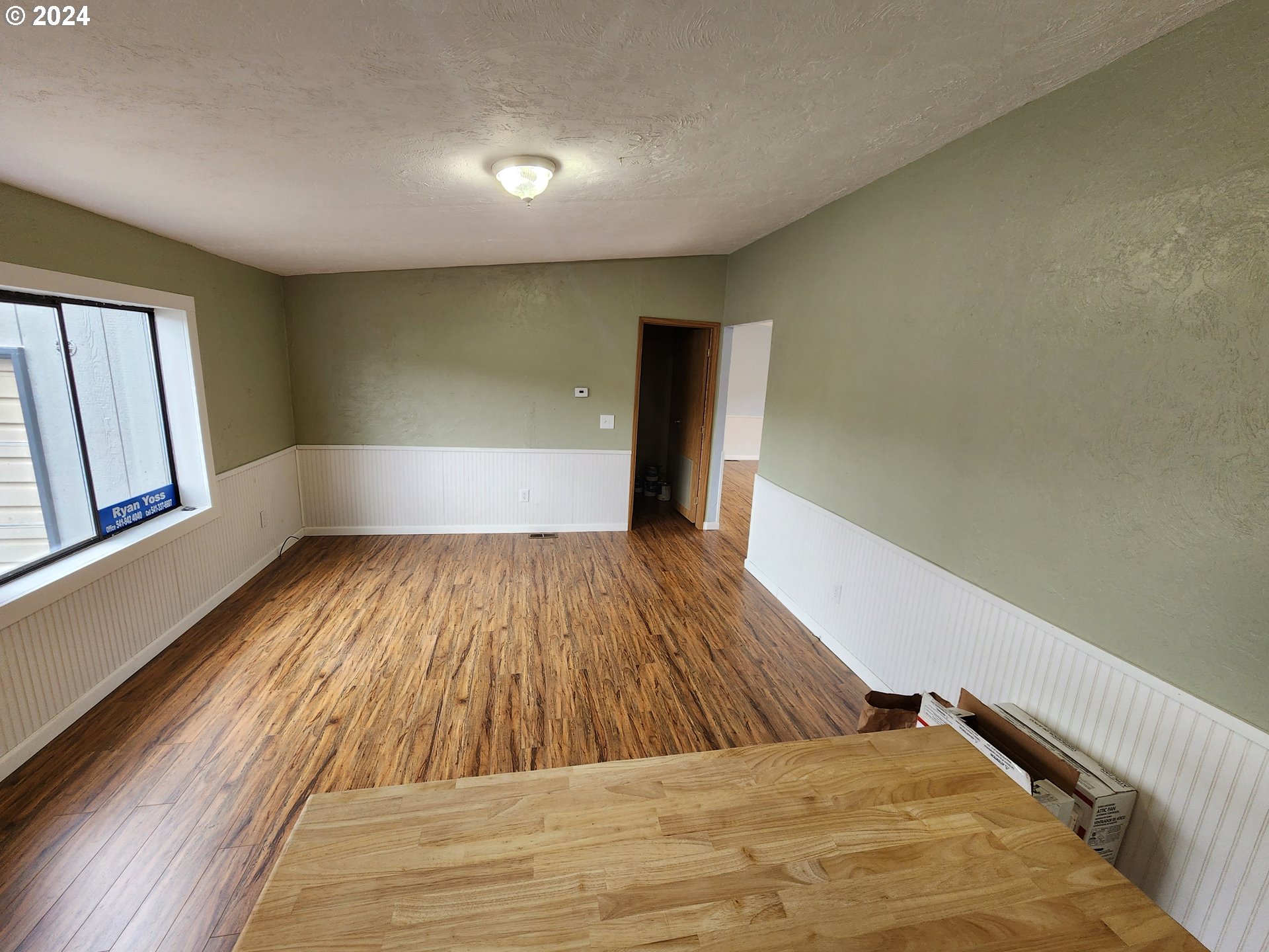 100 River Bend Road, Unit 127 Reedsport, OR 97467 - Photo 5 of 21 a view of empty room with wooden floor