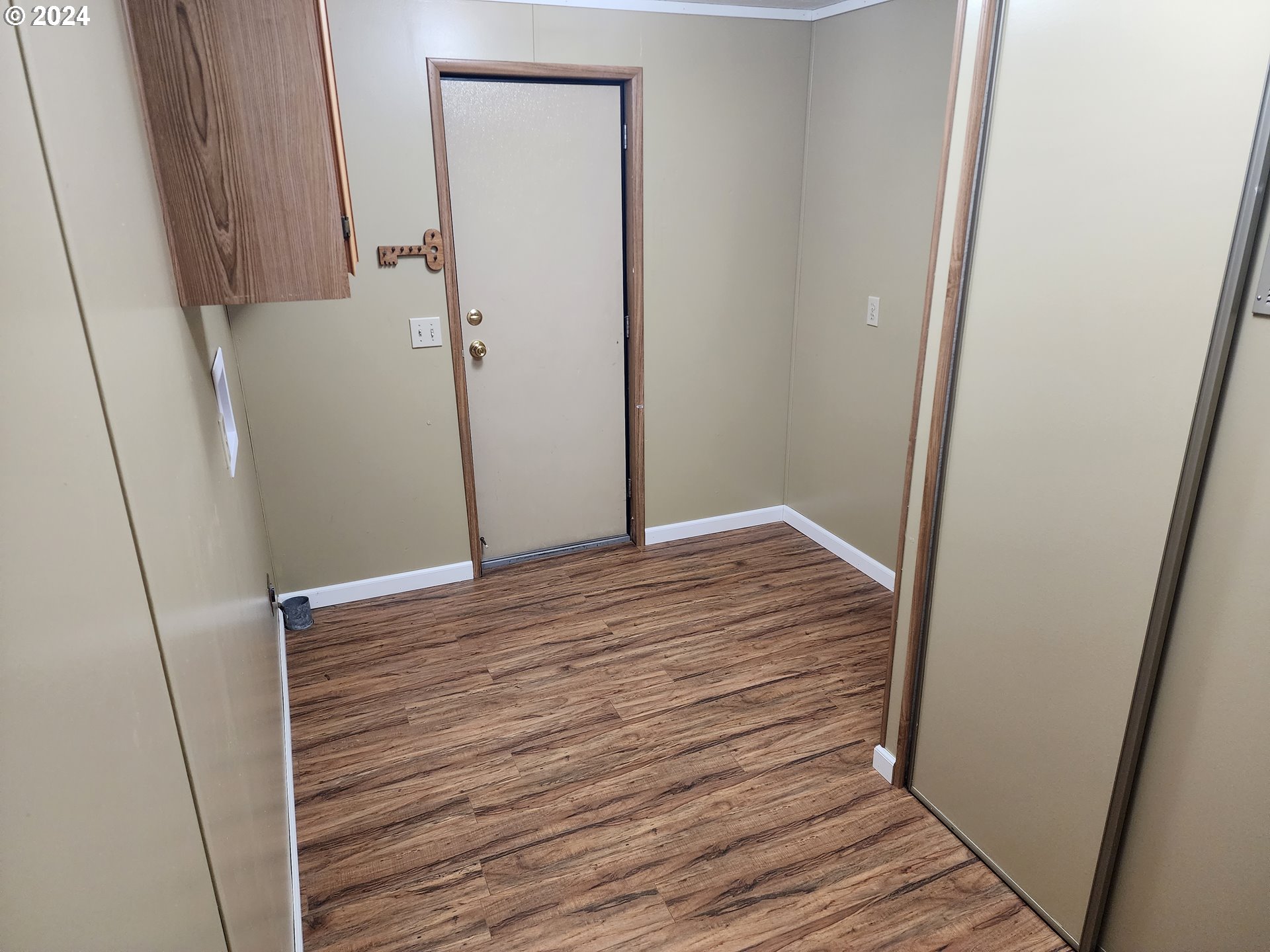 100 River Bend Road, Unit 127 Reedsport, OR 97467 - Photo 6 of 21 a view of wooden floor