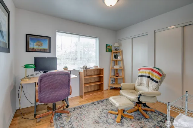 a workspace with furniture and a window