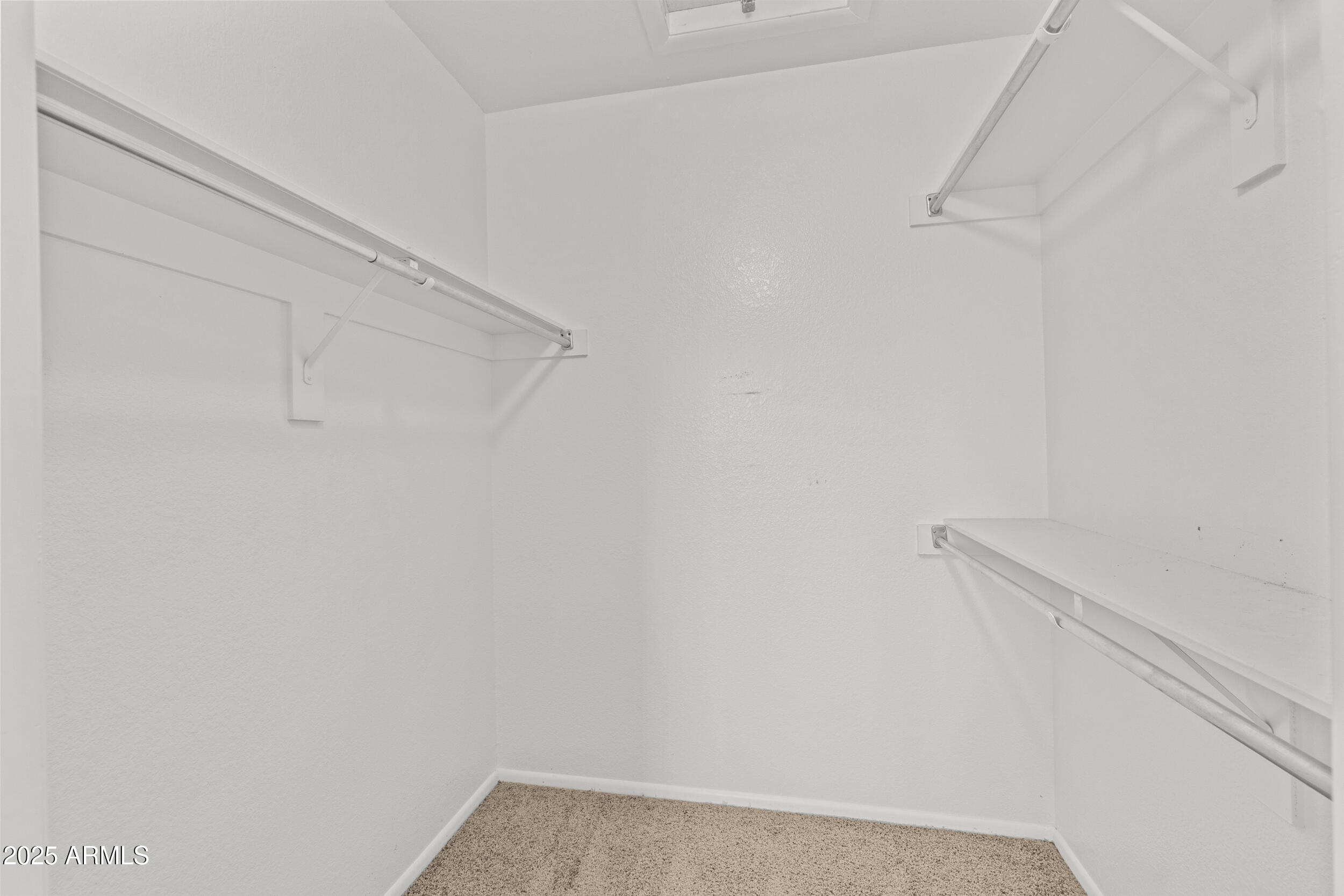 4119 West St John Road Glendale, AZ 85308 - Photo 18 of 29 a view of small space with racks on the wall