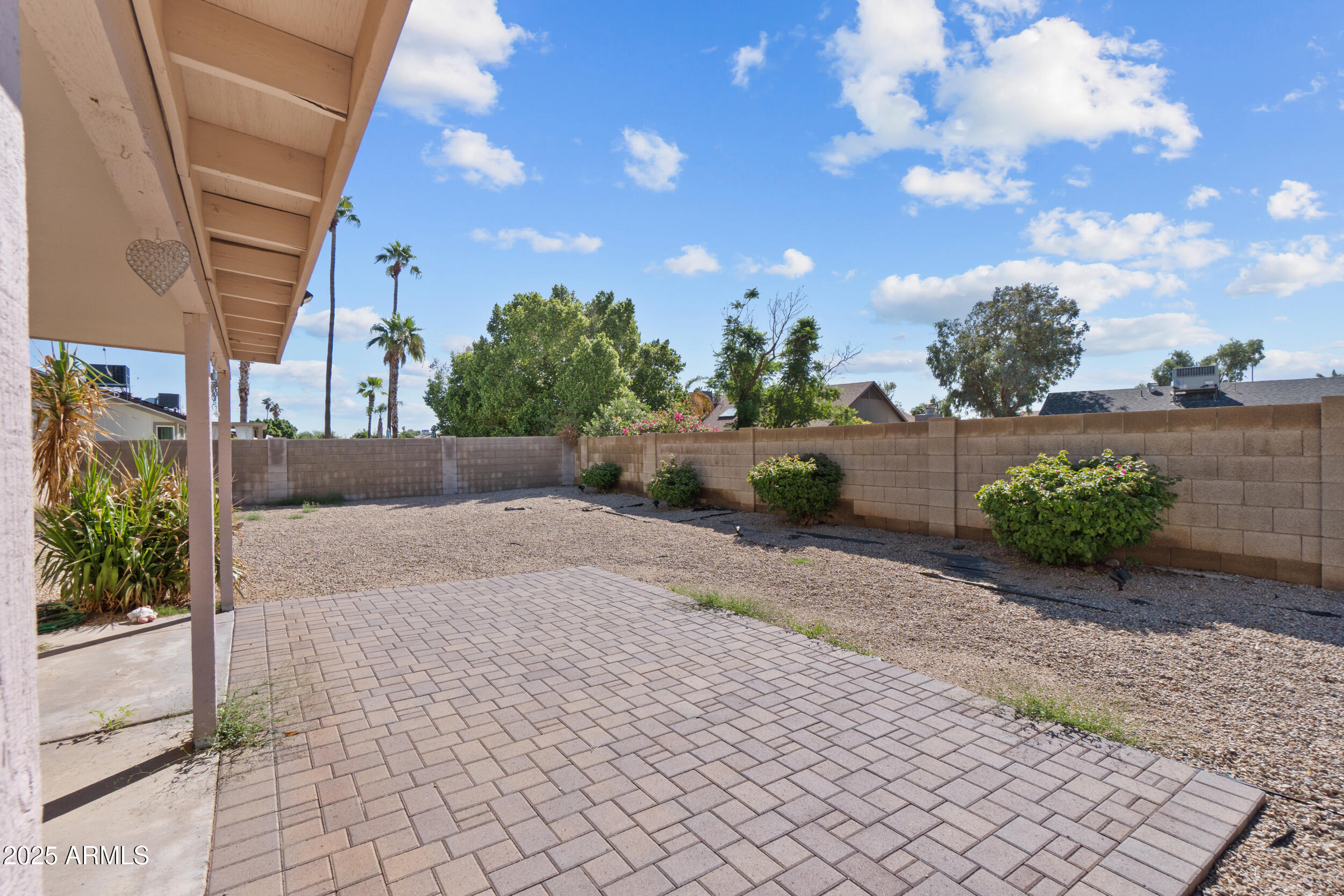 4119 West St John Road Glendale, AZ 85308 - Photo 27 of 29 a view of a street with flower plants