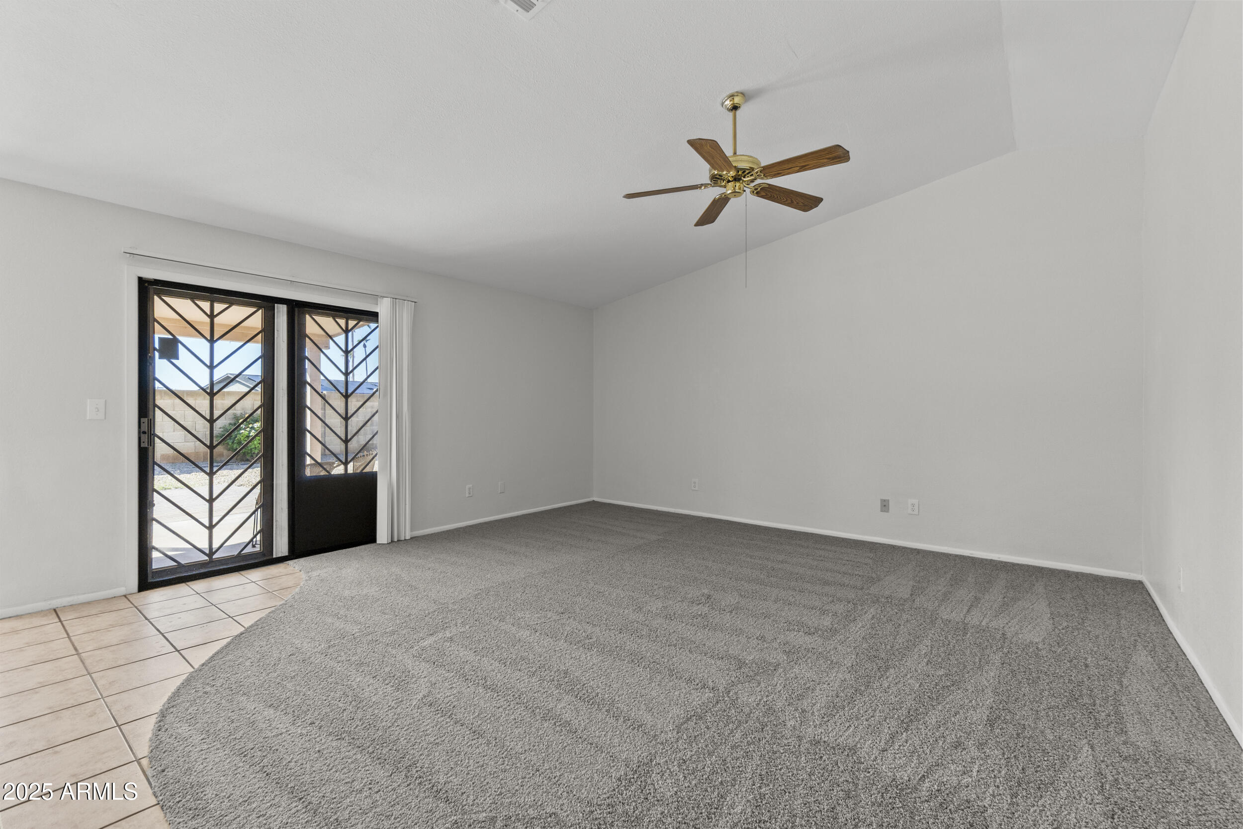 4119 West St John Road Glendale, AZ 85308 - Photo 5 of 29 a view of empty room with windows
