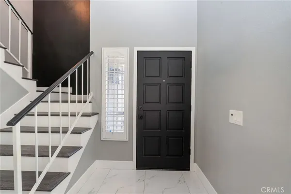 a view of entryway with a front door