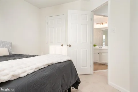 a bedroom with a bed and a cabinets