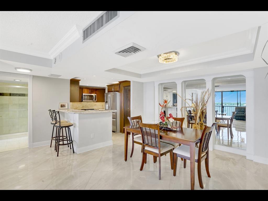 a view of a dining room with furniture