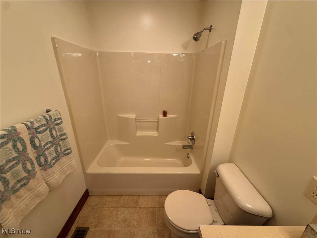 2597 Pyle Road Dover, OH 44622 - Photo 34 of 50 Full bath with tile patterned flooring and bathtub / shower combination