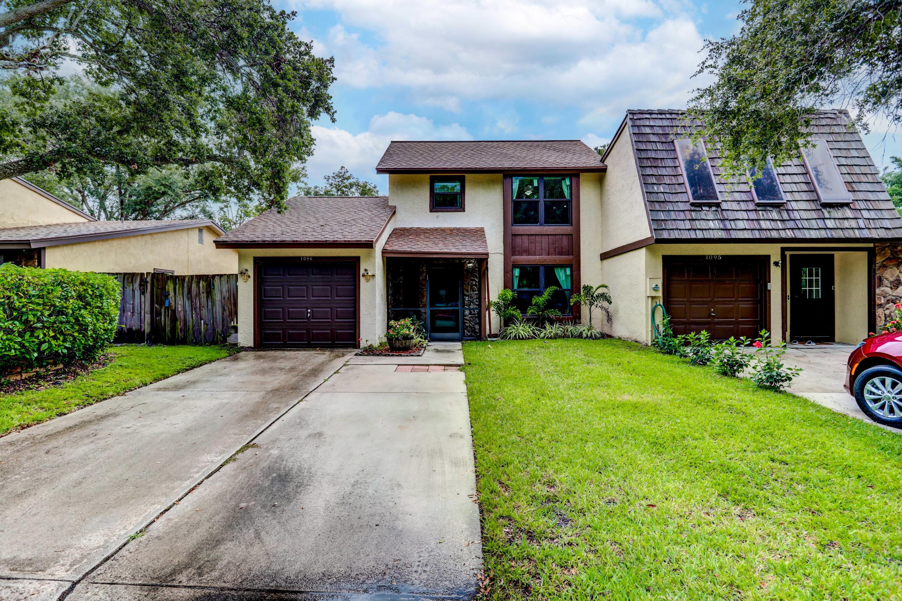 1096 Raintree Court Palm Beach Gardens, FL 33410 - Photo 1 of 26 01_img_0757_58_59_60_61_62_63