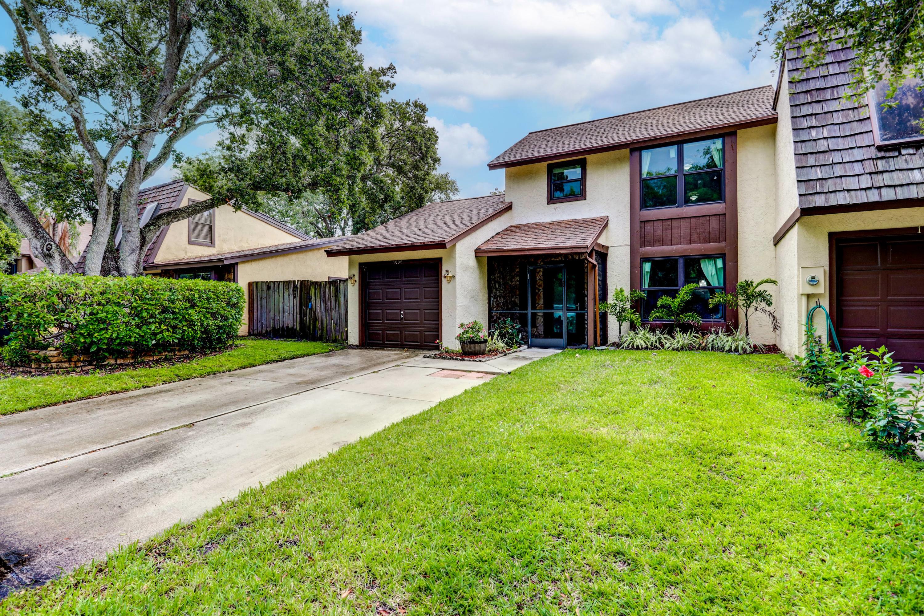 1096 Raintree Court Palm Beach Gardens, FL 33410 - Photo 2 of 26 03_img_0771_2_3_4_5_6_7