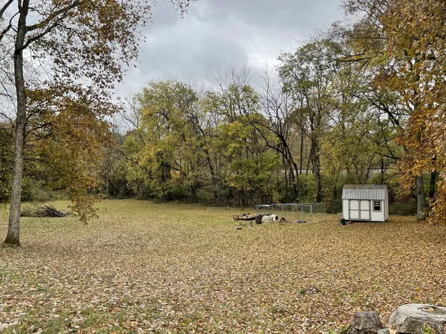 a view of a house with a trees
