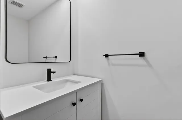 a view of swimming pool from a balcony