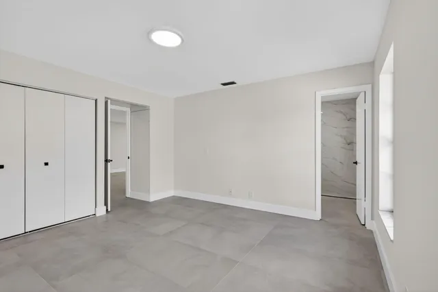 an empty room with windows