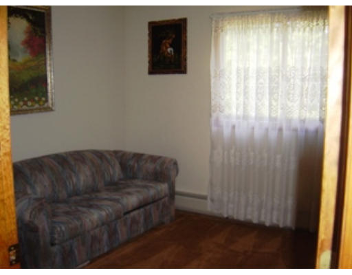 568 Burts Pit Road Northampton, MA 01062 - Photo 8 of 16 a living room with furniture and a window
