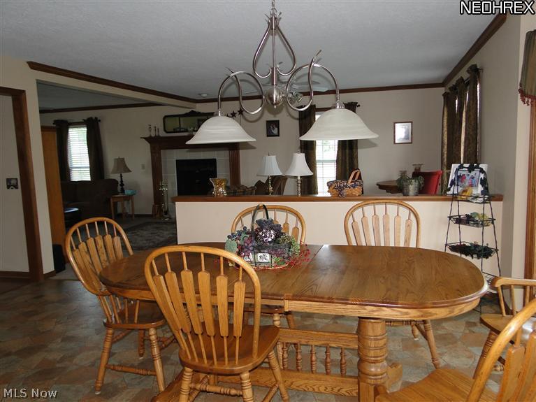5380 Seville Road Seville, OH 44273 - Photo 17 of 17 Eat-in kitchen transitions to the living area with this open floor plan.